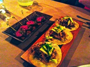 Hangar steak and sucking pig tacos